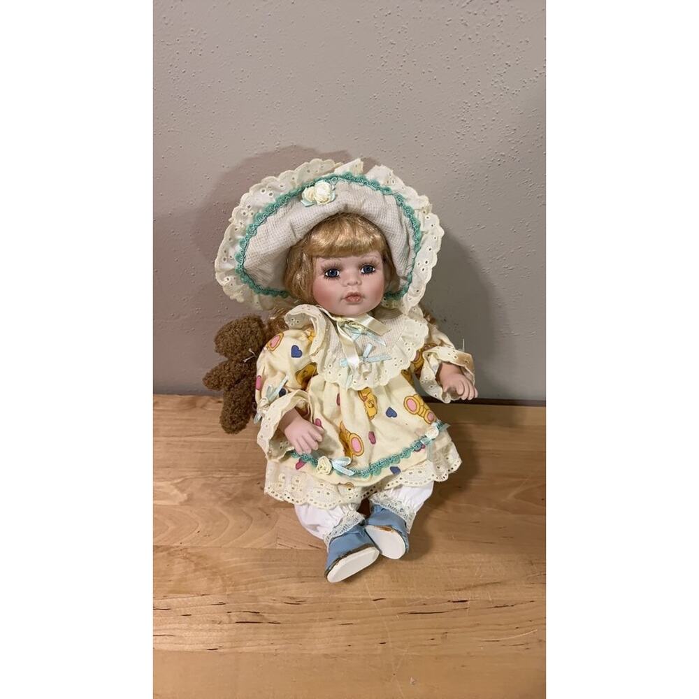 Amanda Treasures Porcelain Doll with Teddy Bear